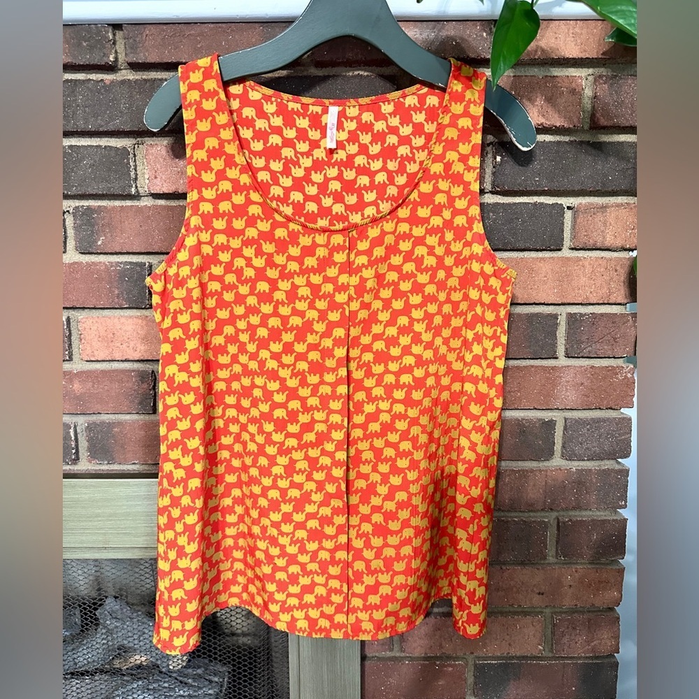 #9)  My story sleeveless top Size Medium excellent condition